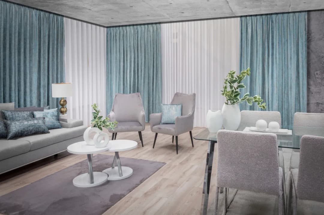 Jakie dodatki do biało szarego salonu, aby stworzyć wyjątkowy klimat